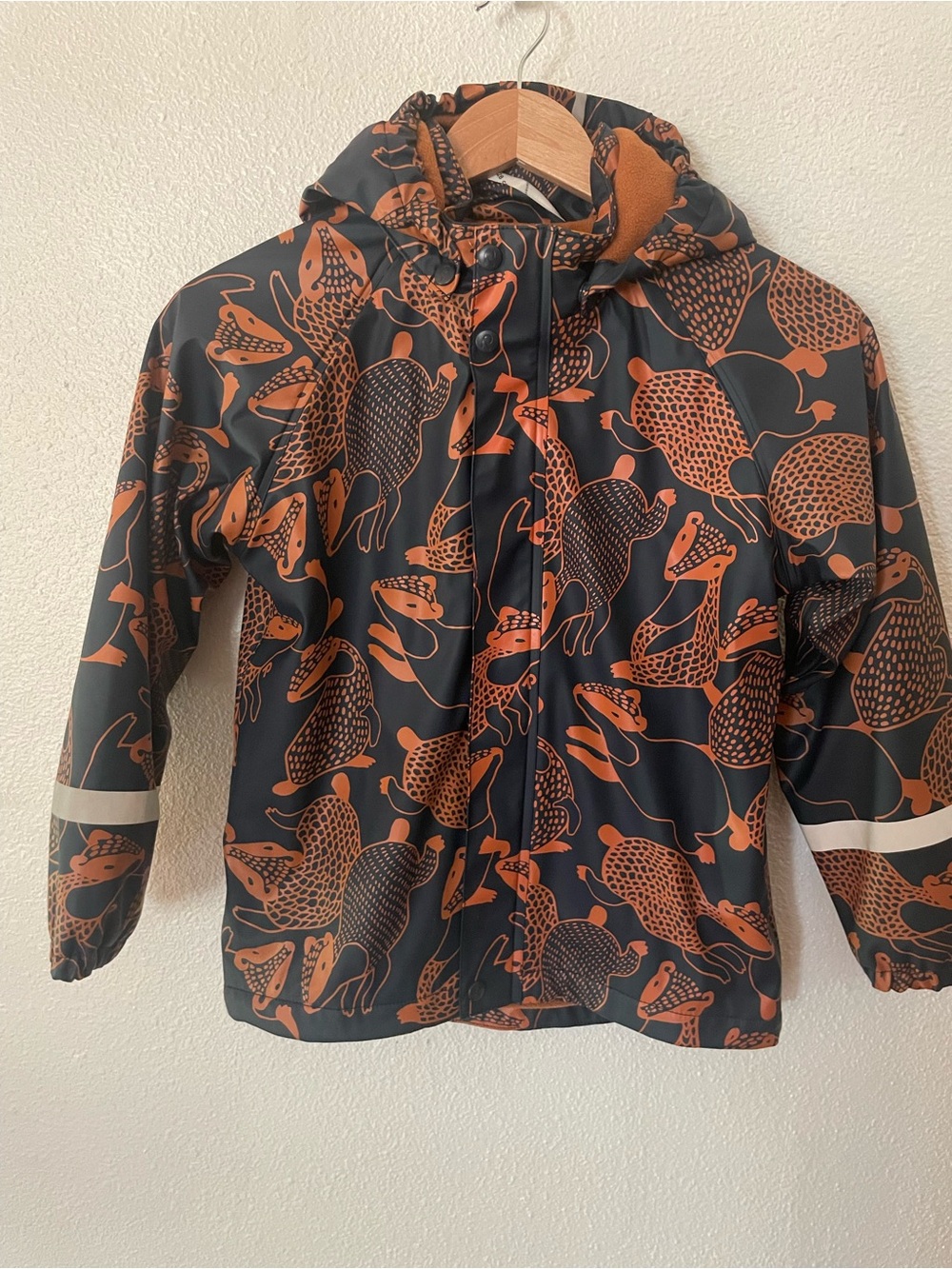 Reima Koski kids' rain jacket in navy with a distinctive animal print size 8